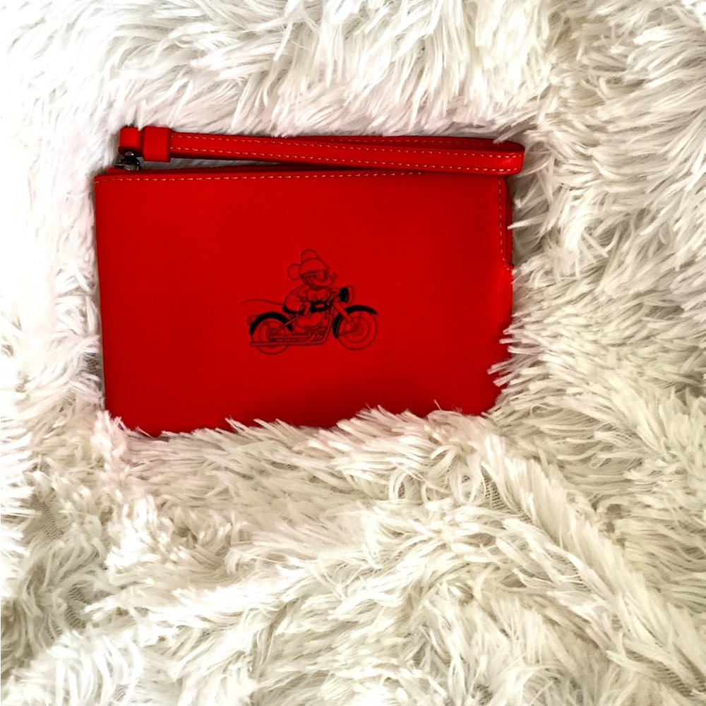 Coach red Mickey on motorcycle wristlet. Smooth leather.